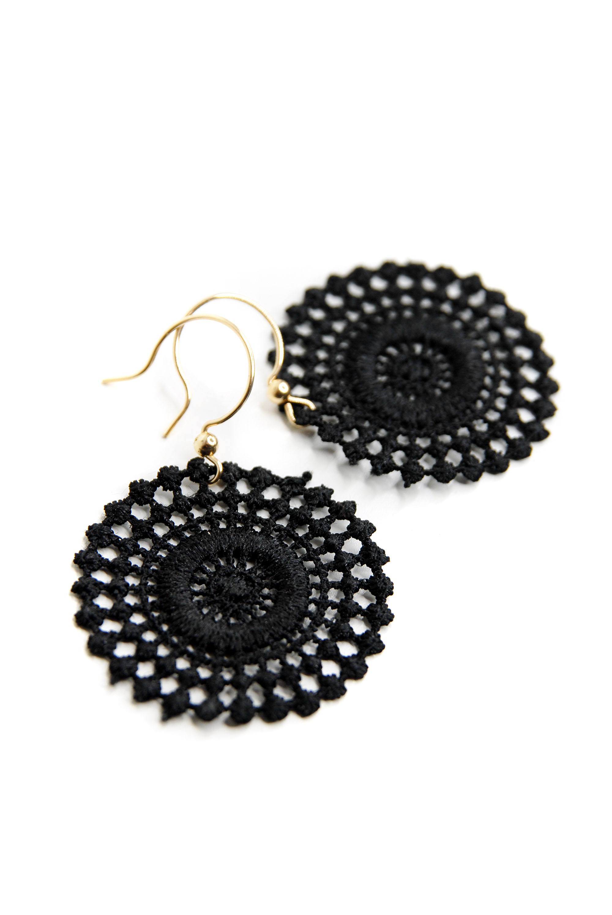 Black sun ear rings